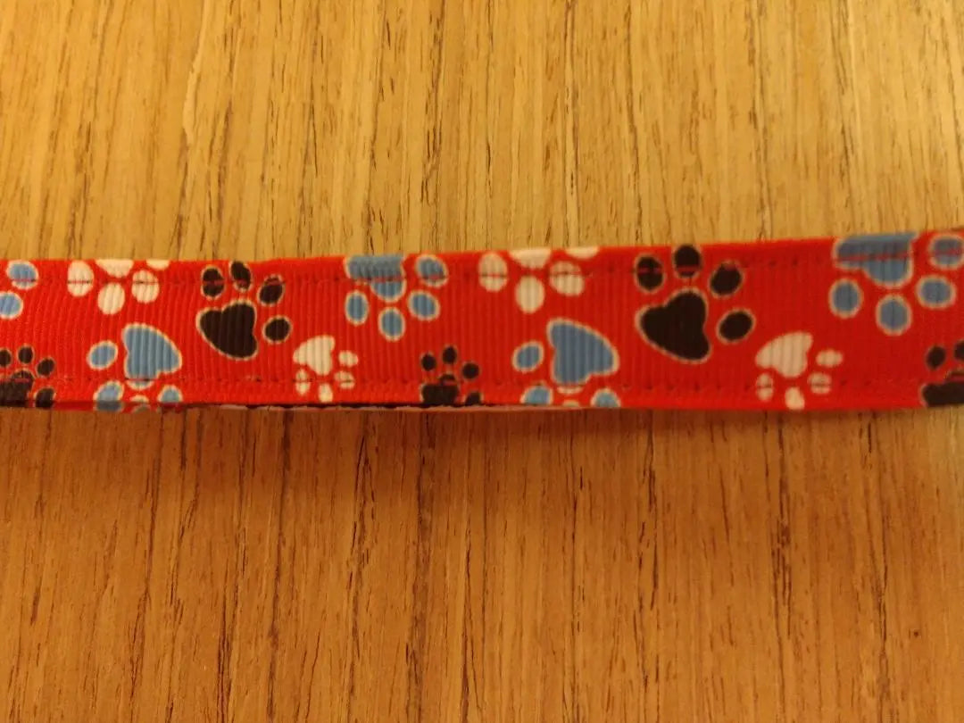 Collar/ Small/ Red & White & Blue & Black Paw Prints Green Thalassa